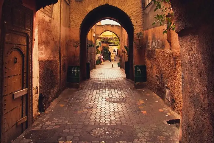Marrakech medina half-day guided walking tour through souks and palaces