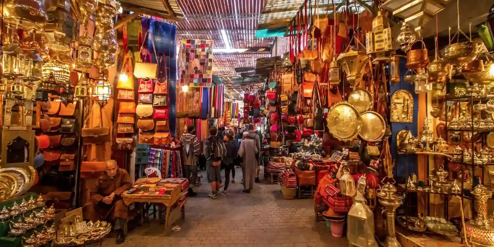 Marrakech souks alleys with spice merchants and metalworkers